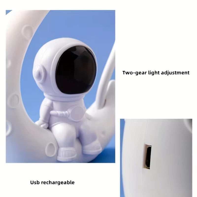 Small desk lamp with moon and astronaut design